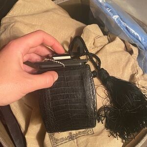 The Row Chic Black Crocodile Clutch with Tassel